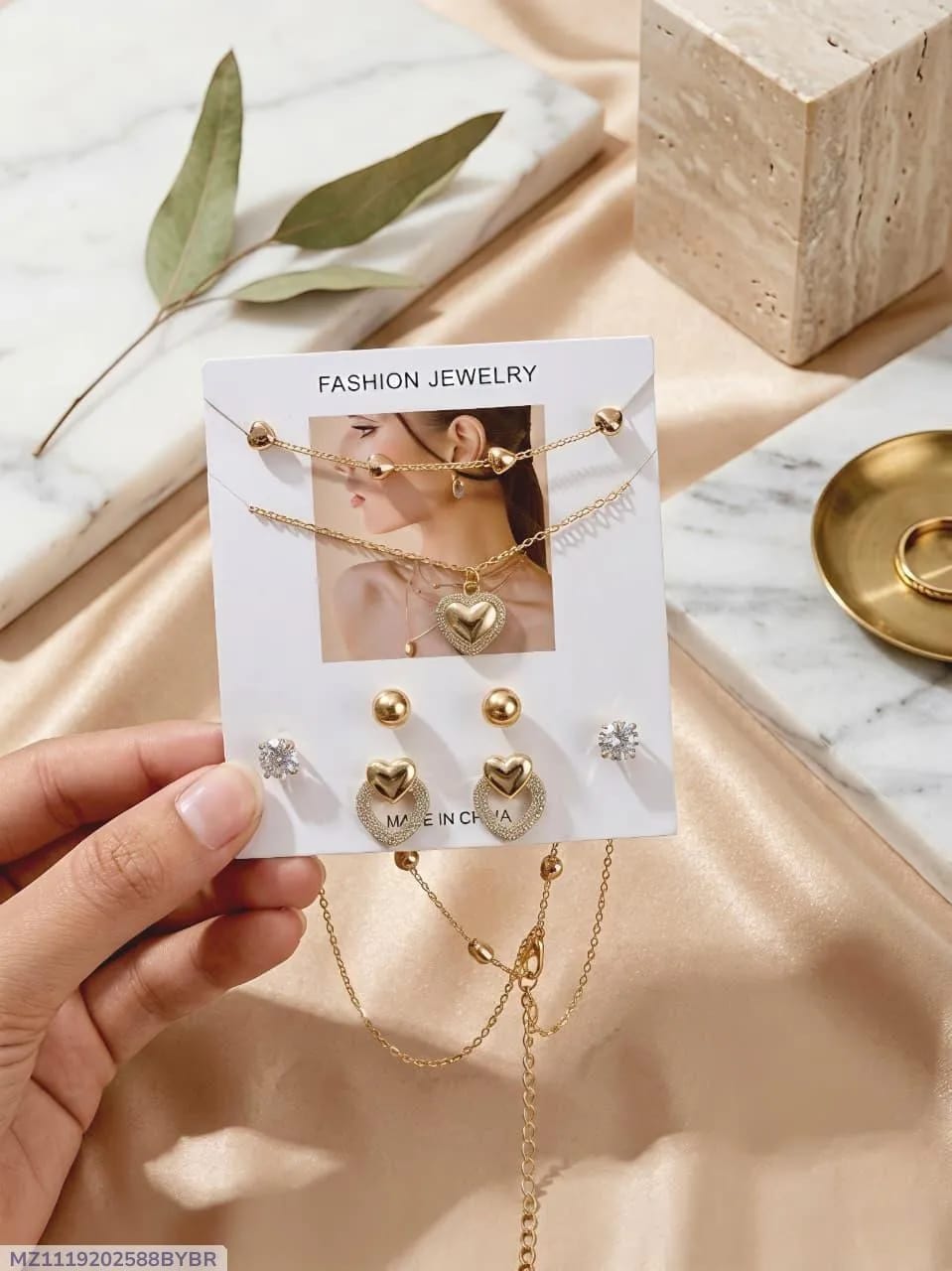 Gold plated crystal woman design to wear